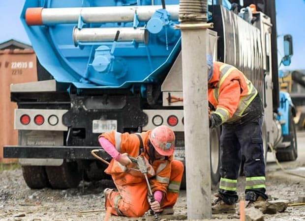 Hydrovac truck, water lance, vacuum boom hose